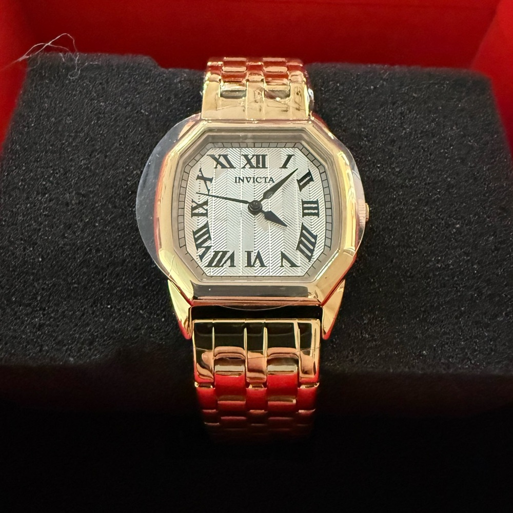 Invicta Gold Timepiece with Roman Dial